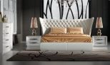 Domital Tufted Leather King Bed